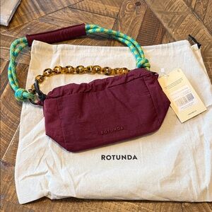 Rotunda Burgundy Bag with Vibrant Handle